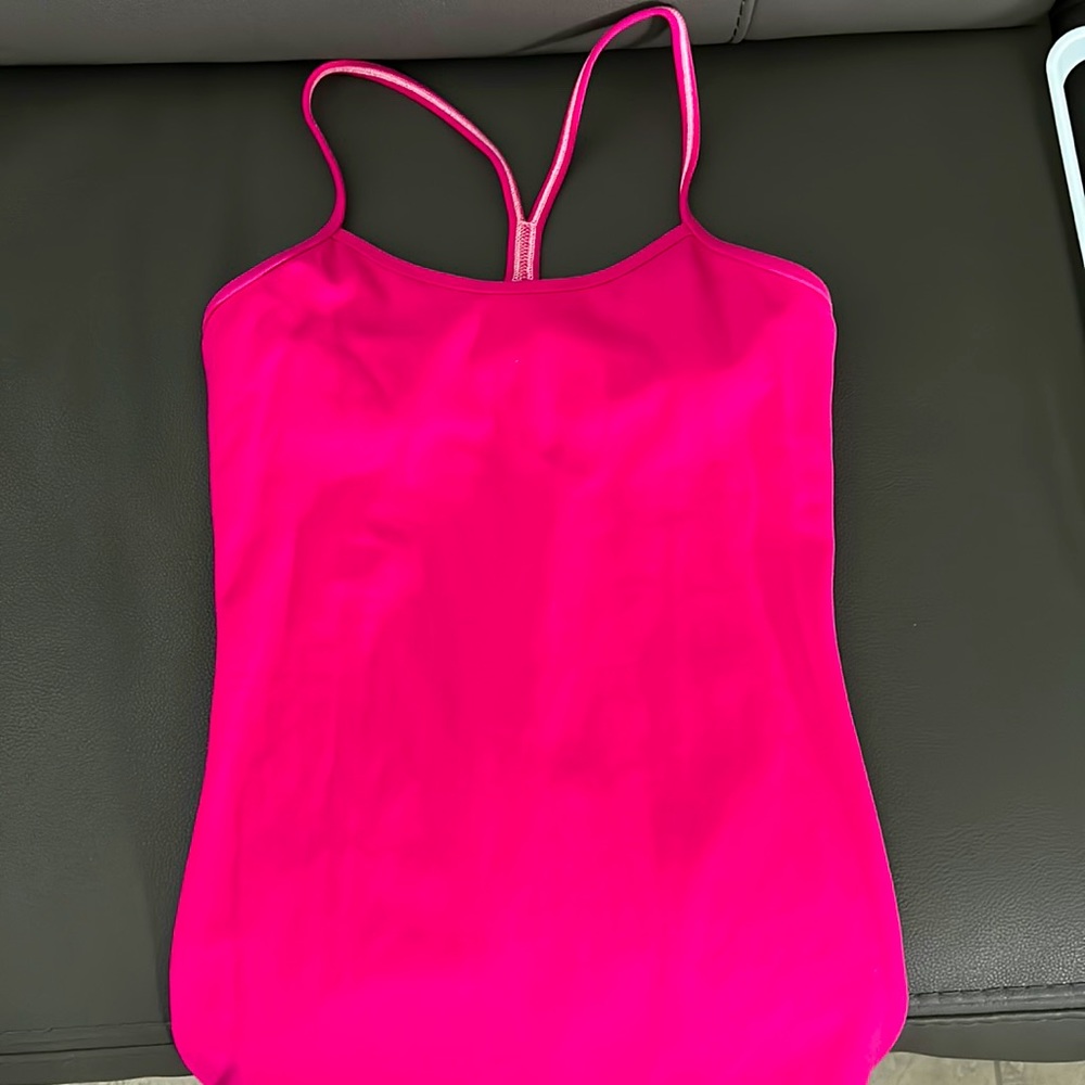 Lululemon pink tank. Brand new without tags. Size 4